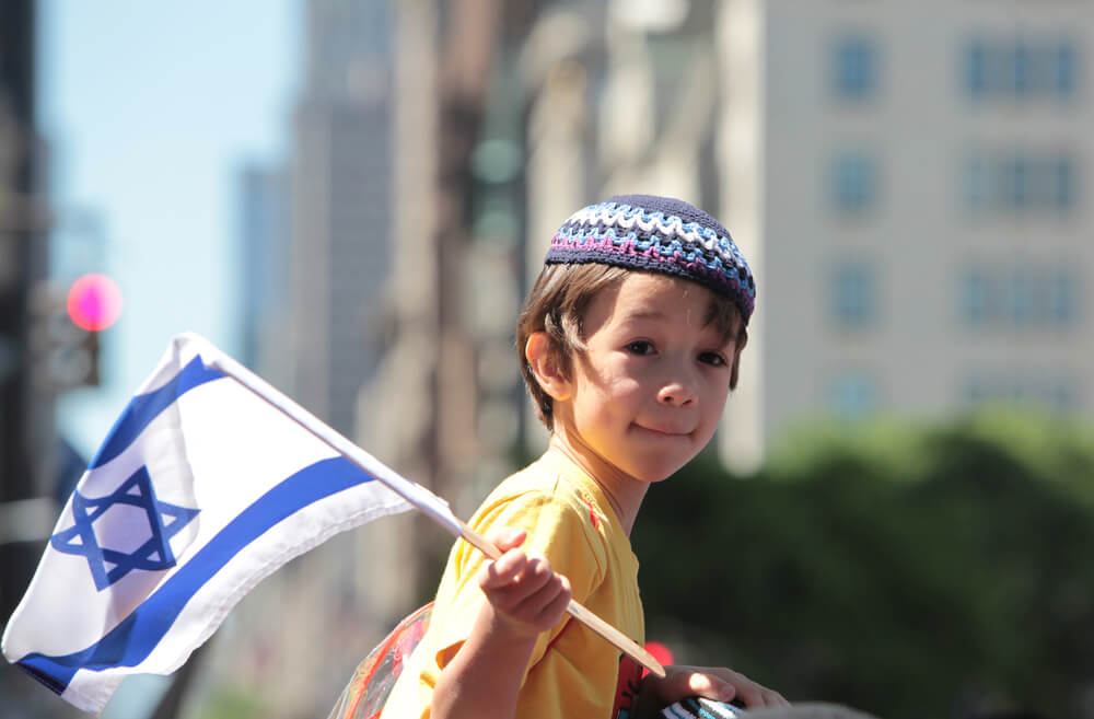 A Jewish Boy at a Parade