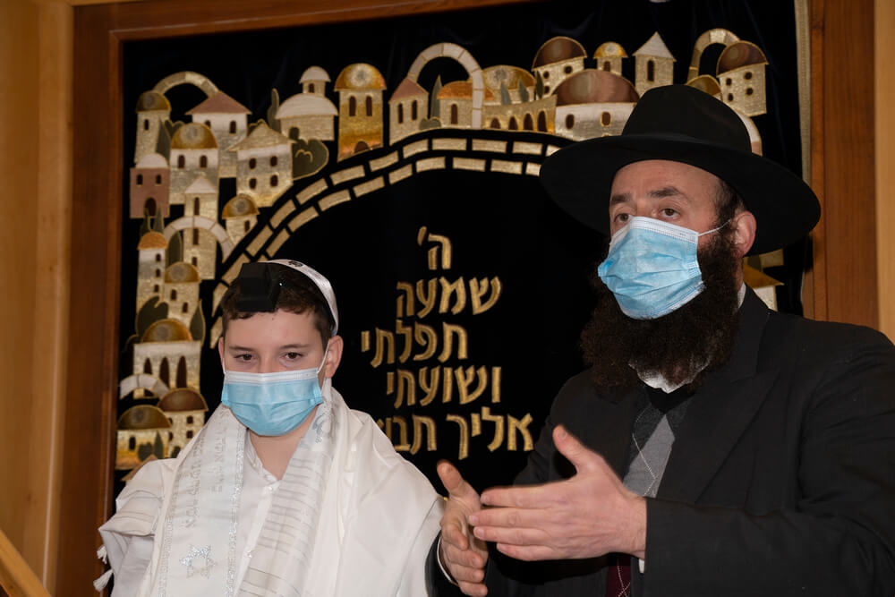 A Rabbi Speaks At a Bar Mitzvah Event in a Synagogue