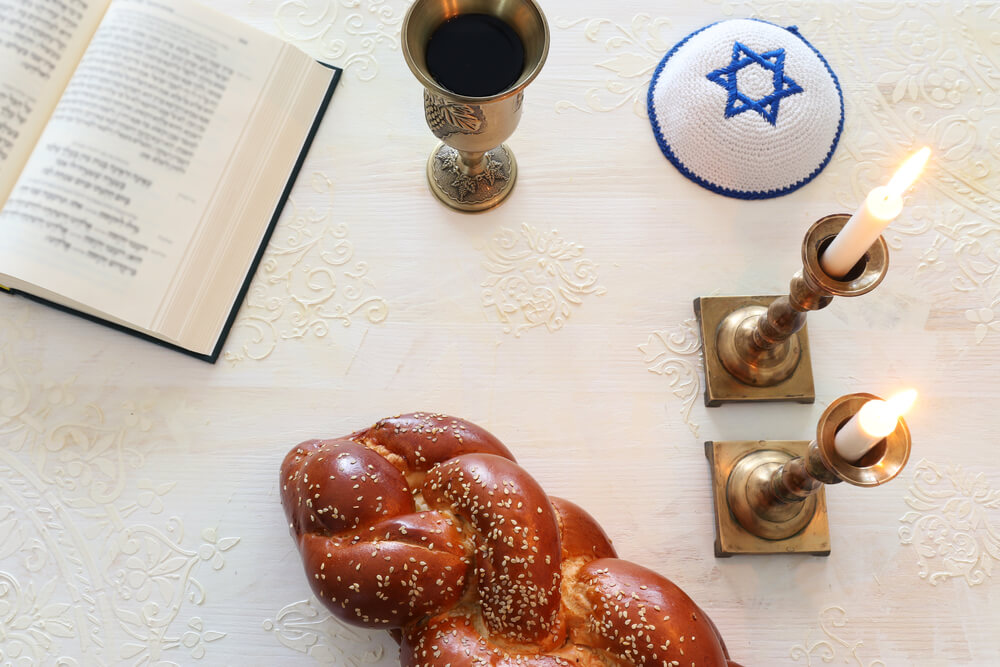 Shabbat Image. Challah Bread, Shabbat Wine and Candles. Top View